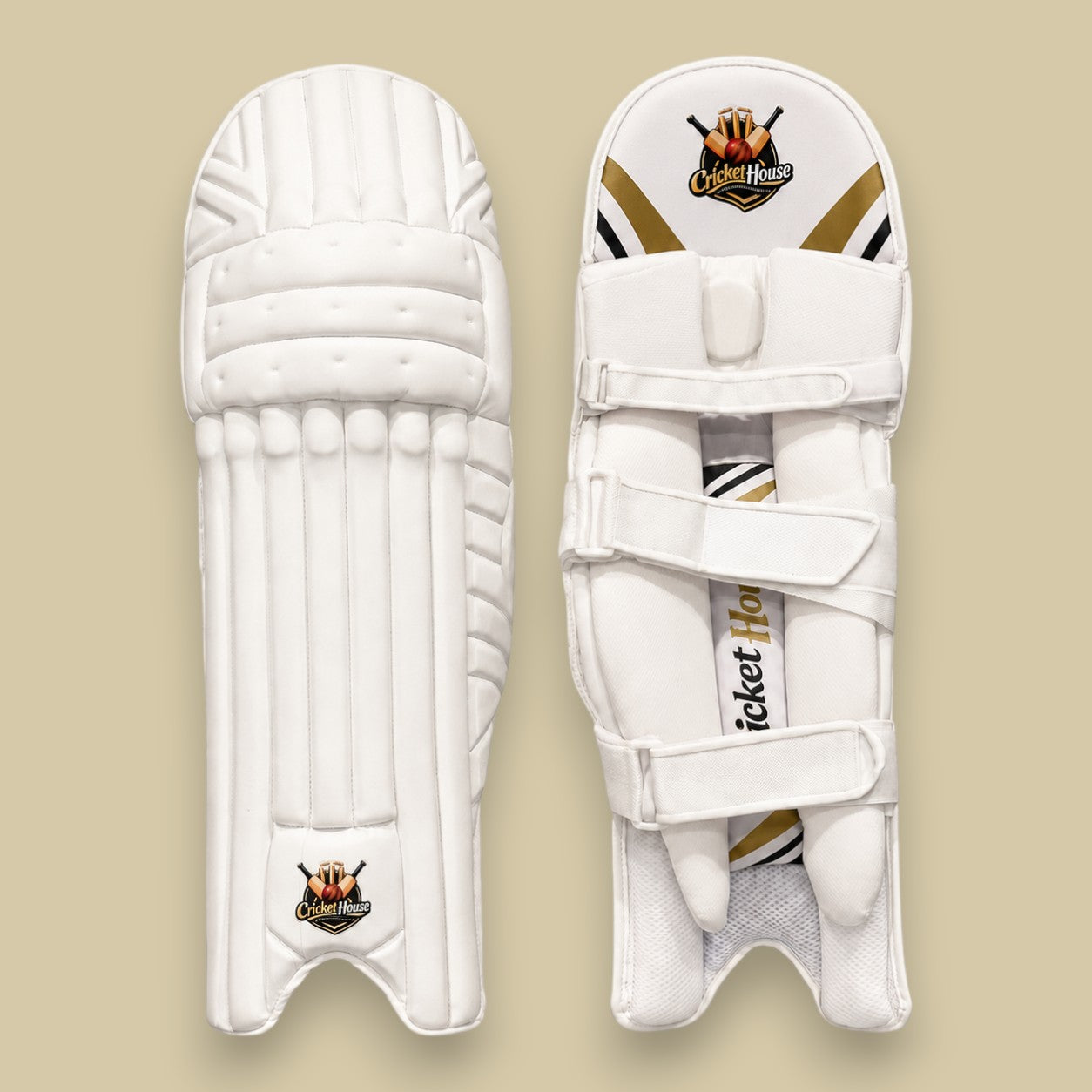 Cricket House white batting pads featuring a traditional 3-piece knee roll, triple-strap system, and side wing protection.