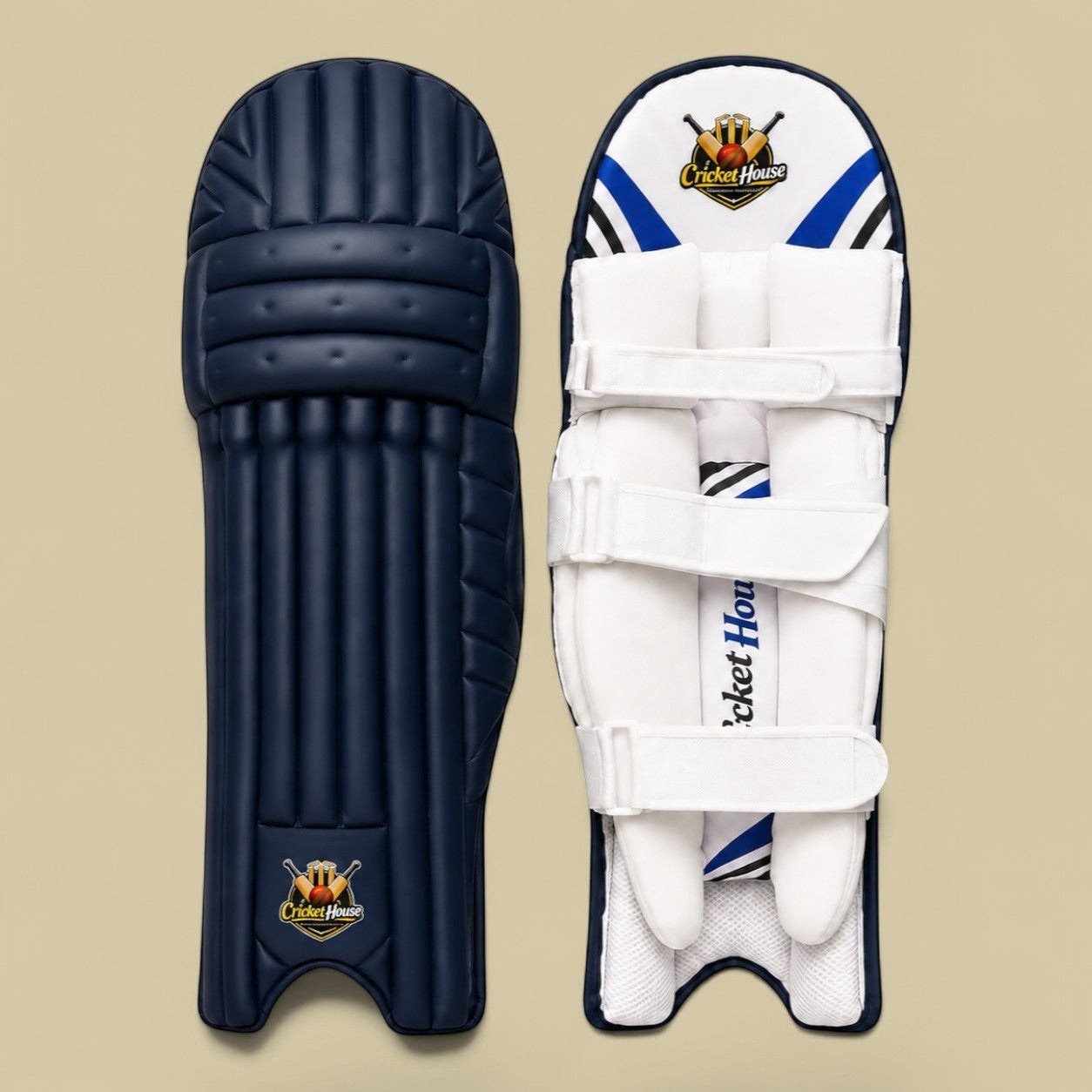 Cricket House blue batting pads with a traditional 3-piece knee roll, triple-strap fastening, and side wing protection.