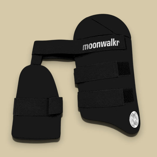 Cricket House Moonwalkr adult cricket thigh pad with integrated dual-guard design for inner and outer leg protection.