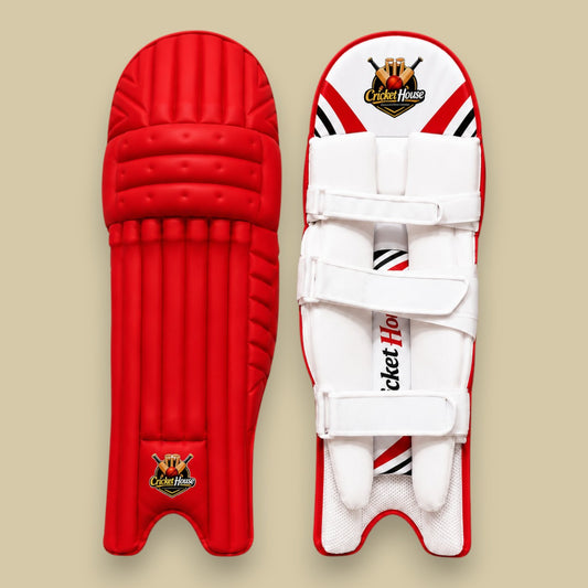 Cricket House red batting pads with a traditional three-piece knee roll, triple-strap system, and protective design.